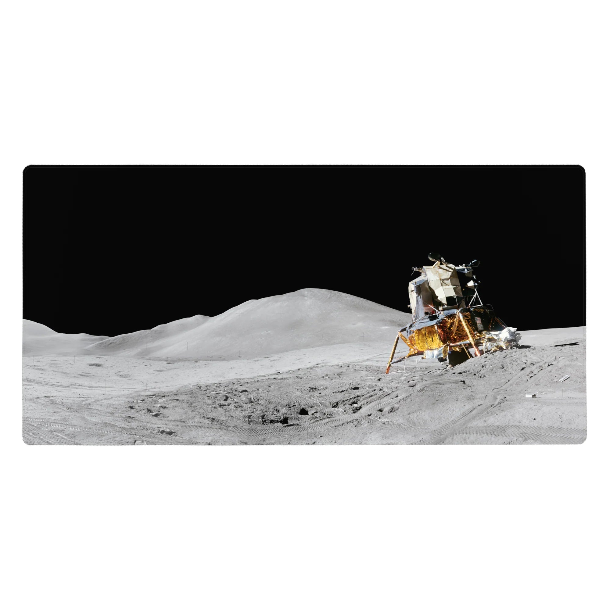 Moon surface desk pad 40x20 inches with gold lander, etched tracks, and crisp shadows under black sky.