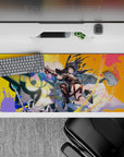 Neon teal, candy pink, and hot orange anime desk pad 36x16 inches with high-energy action vibe.