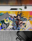 Neon teal, candy pink, and hot orange anime desk pad 40x20 inches with high-energy action vibe.