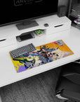 28x12 inches anime desk mat showing sharp-eyed dark-haired girl in goggles firing twin pistols on graffiti wall.