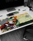 Attack on Titan desk pad 40x20 inches featuring Levi soaring through golden clouds, vibrant sky, and dynamic colors.