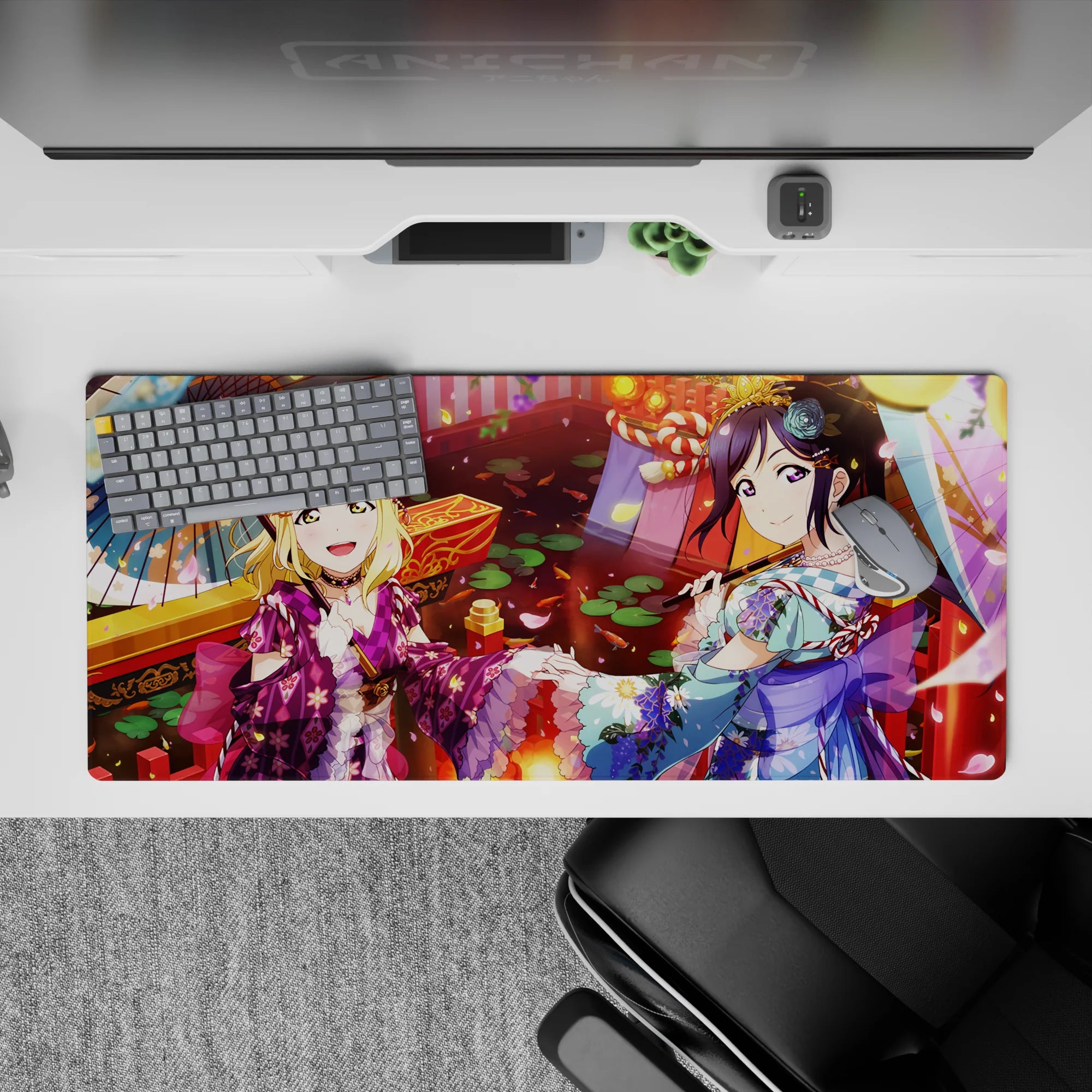 36x16 inches anime desk pad in pink petals, gold lantern glow, koi red, with teal and purple accents.