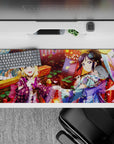 36x16 inches anime desk pad in pink petals, gold lantern glow, koi red, with teal and purple accents.