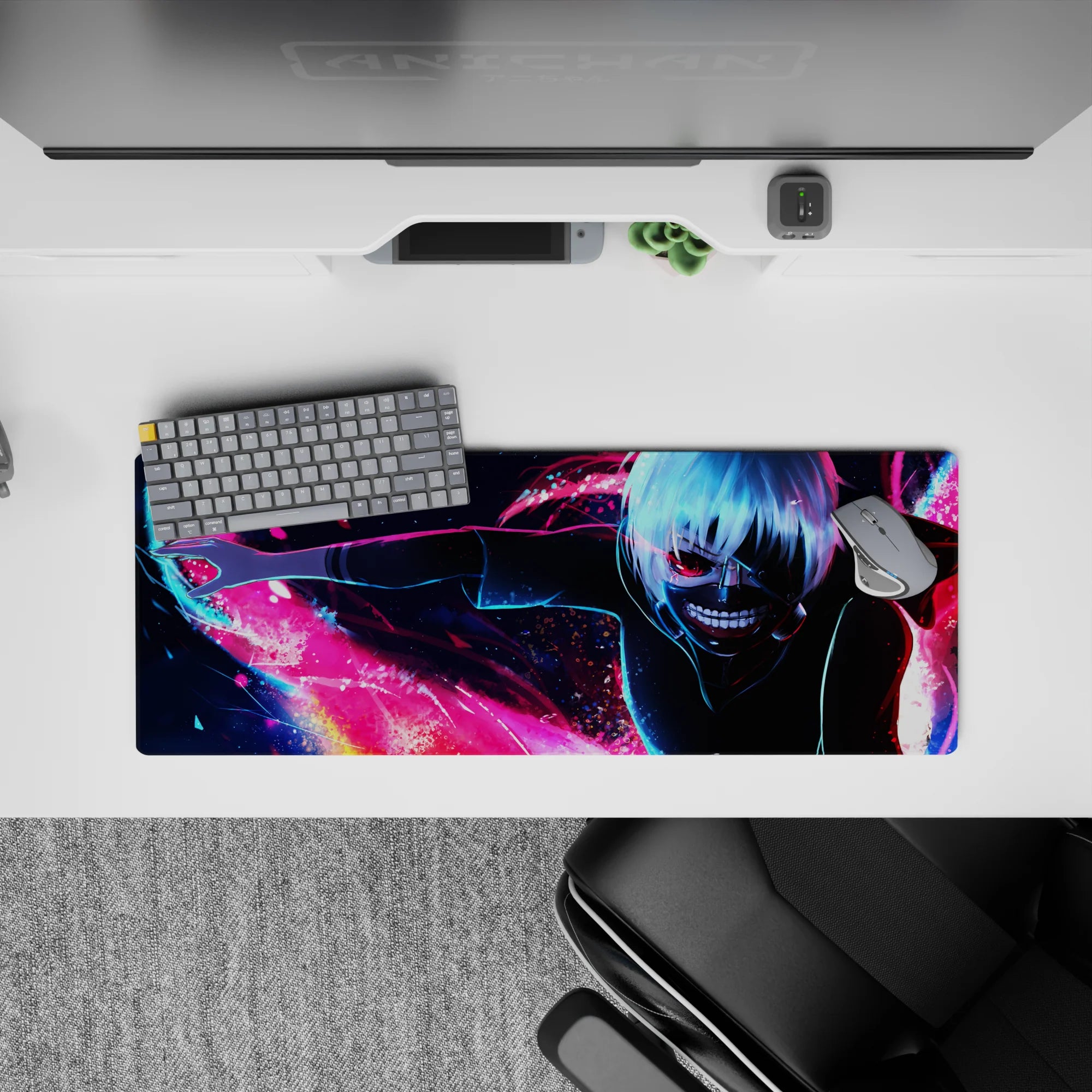 Kaneki from Tokyo Ghoul anime on 32x12 inch mouse pad, showcasing his kagune in vibrant pink, blue, and red against a cityscape.