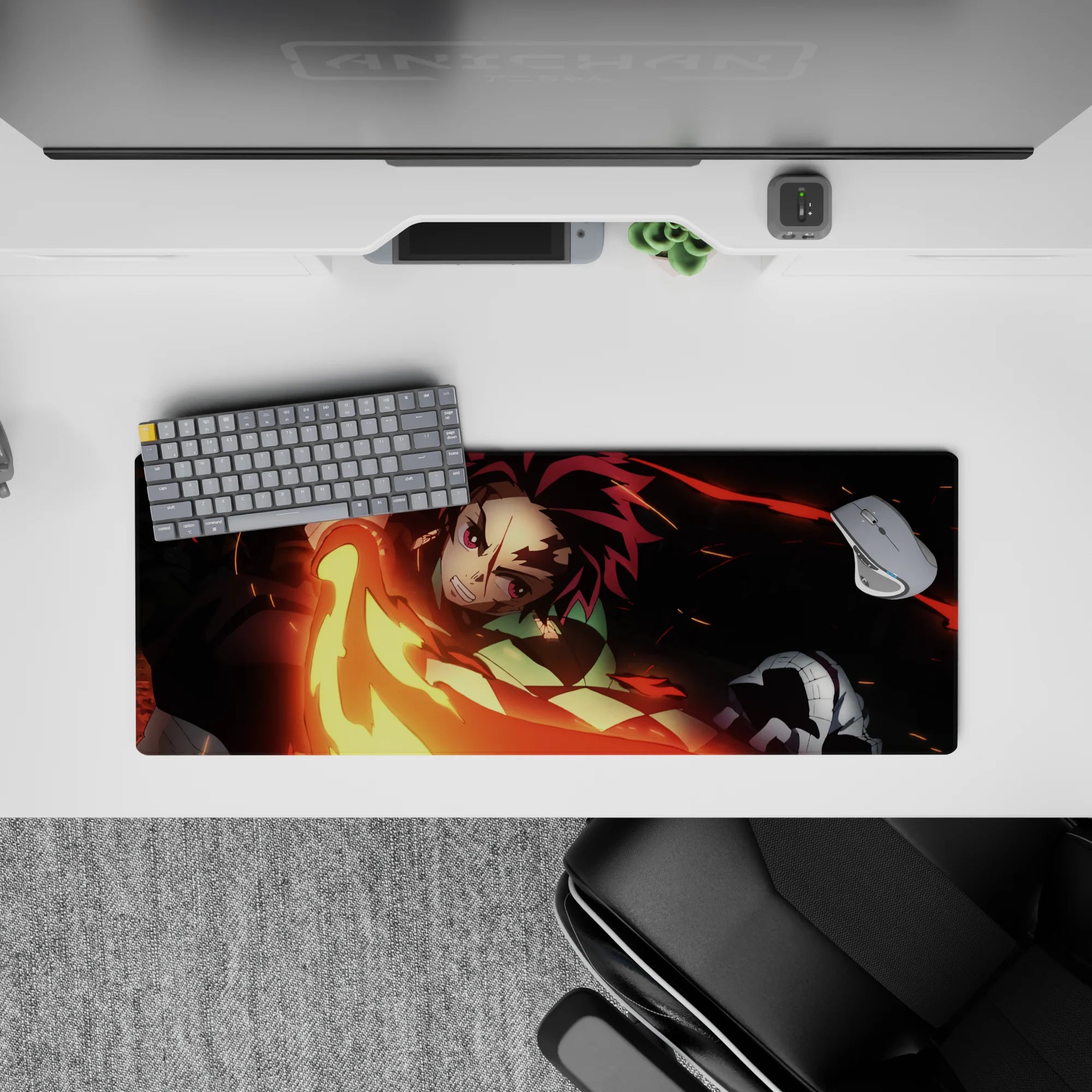 Anime mouse pad 32x12 inches featuring Tanjiro from Demon Slayer with fiery sword swing in red, gold, and embers.