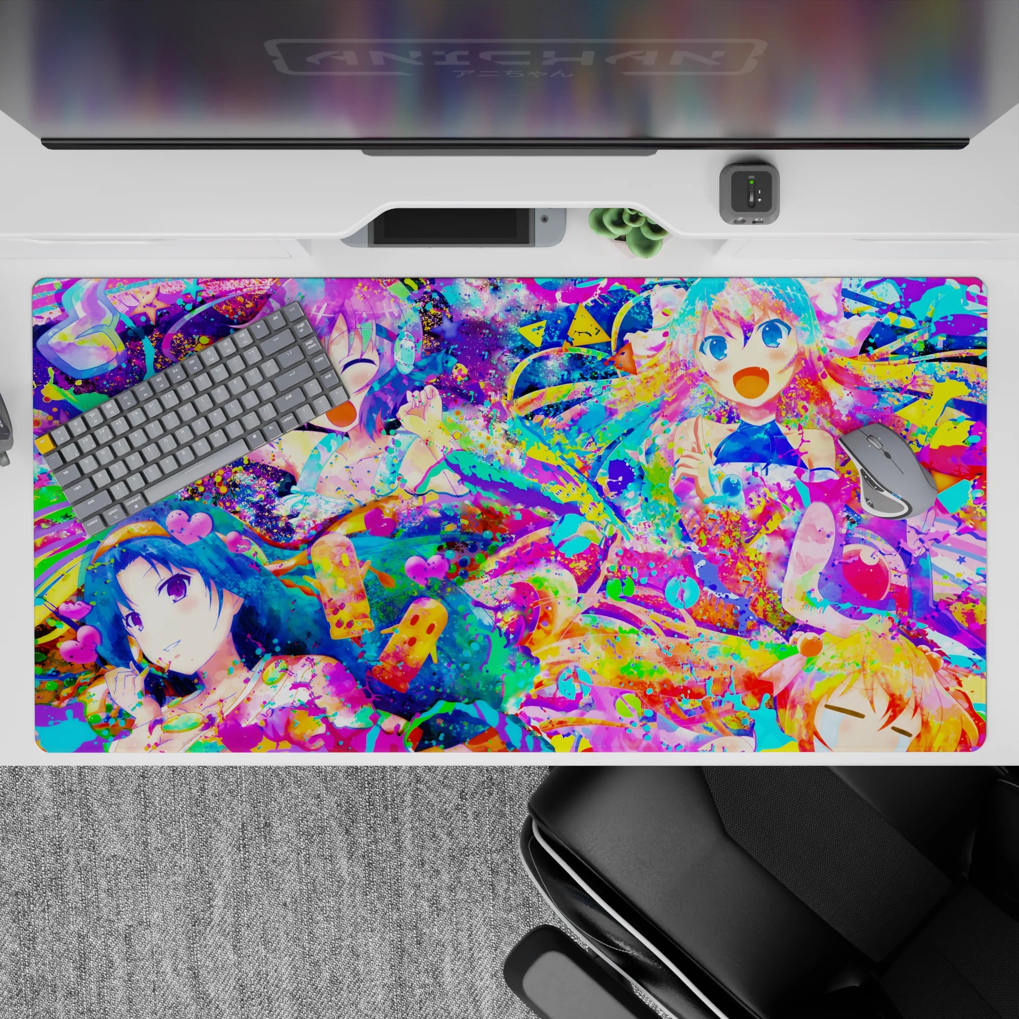 Neon candy-splash anime desk pad 40x20 inches in hot pink, aqua, lemon yellow, playful chaotic vibe.