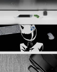 High-contrast black and white anime desk pad 36x16 inches, calm but daring vibe with a sharp blue accent.