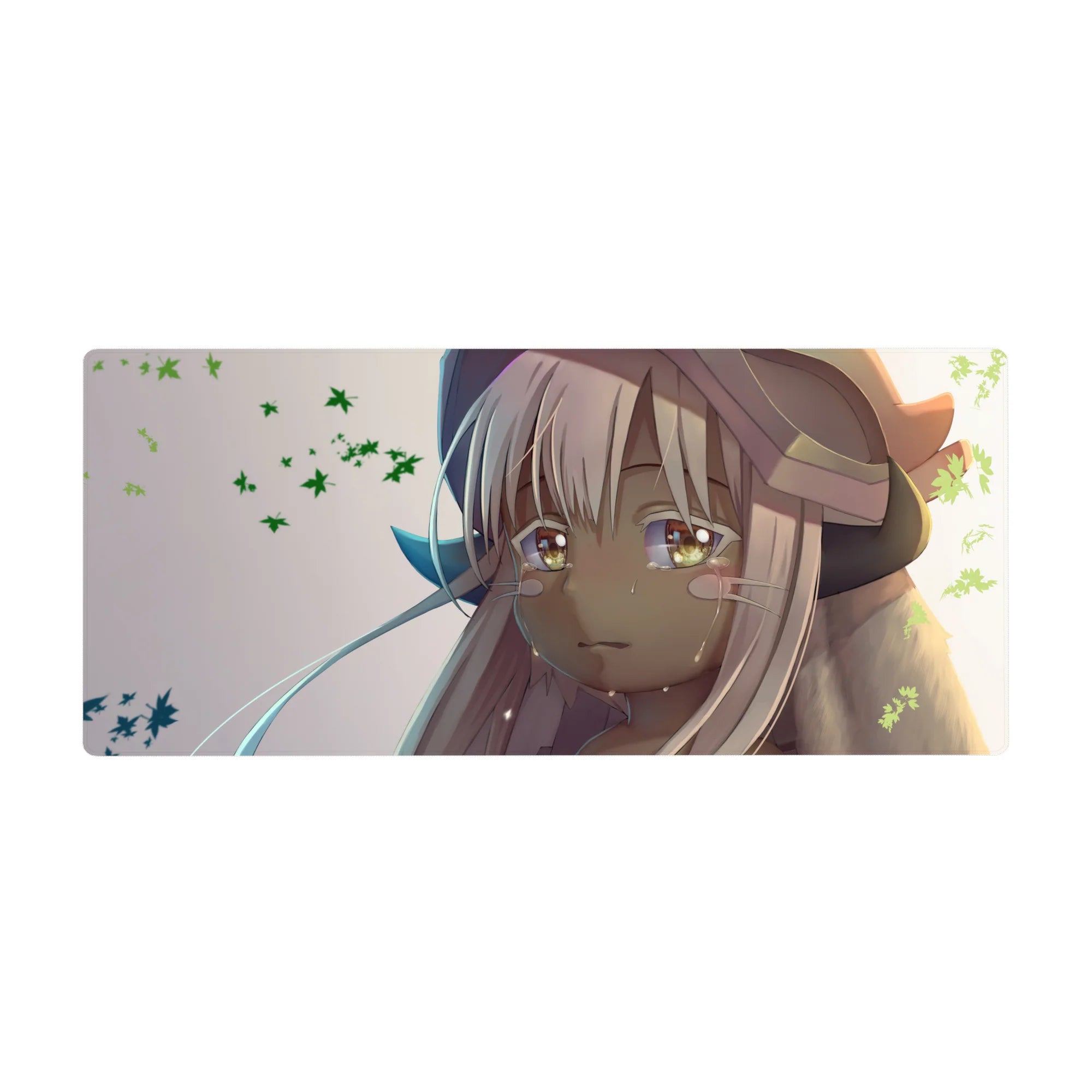 36x16 inches anime girl desk pad with Nanachi gazing up, glossy eyes, tiny tears, and floating leaf shapes.