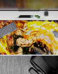 Gold and orange blaze anime desk pad 40x20 inches, vivid green outfit, bold splash-ring energy.