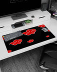 Naruto Akatsuki Itachi-inspired red clouds on black extended gaming mouse pad 32x16 inches.