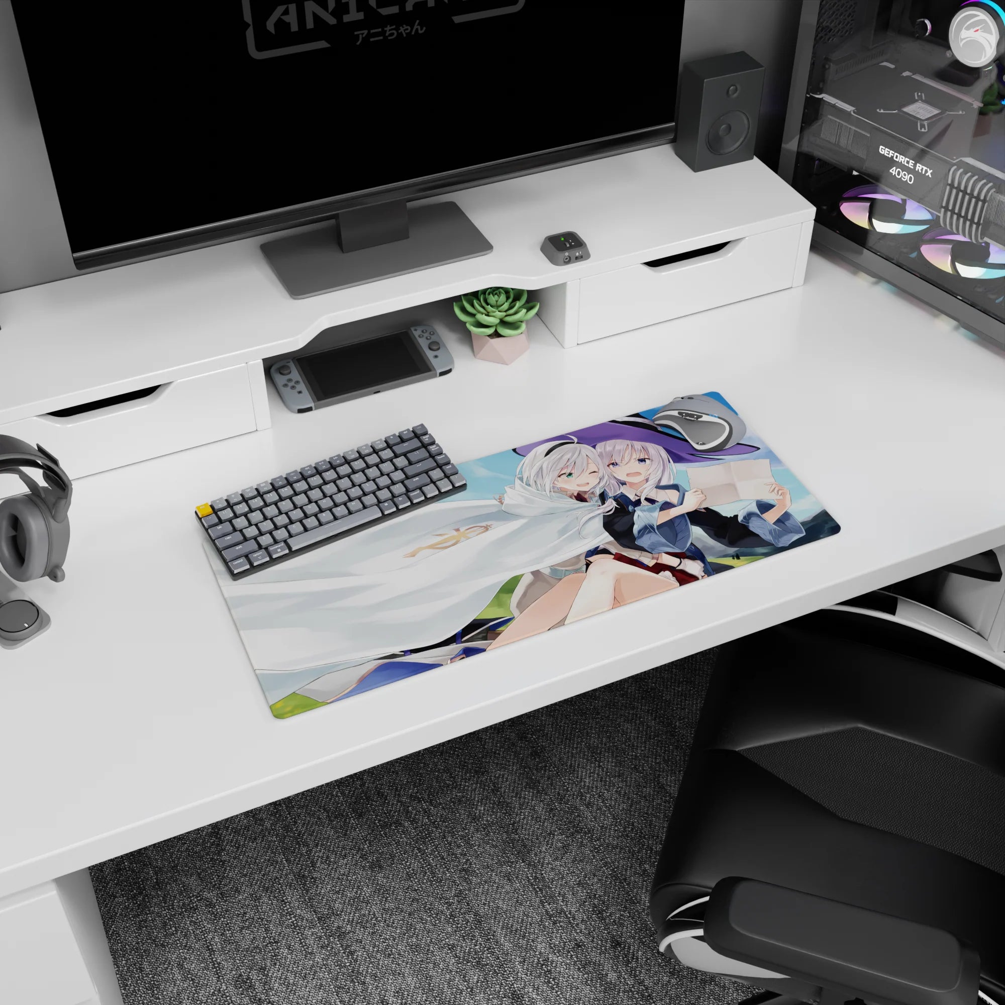 Silver-haired anime duo mouse pad 28x12 inches, one in a big violet witch hat cuddling under a cloak.