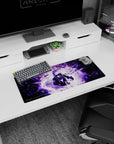 28x12 inches anime mouse pad featuring Sasuke Uchiha with sharp eyes, crackling purple lightning in the rain.