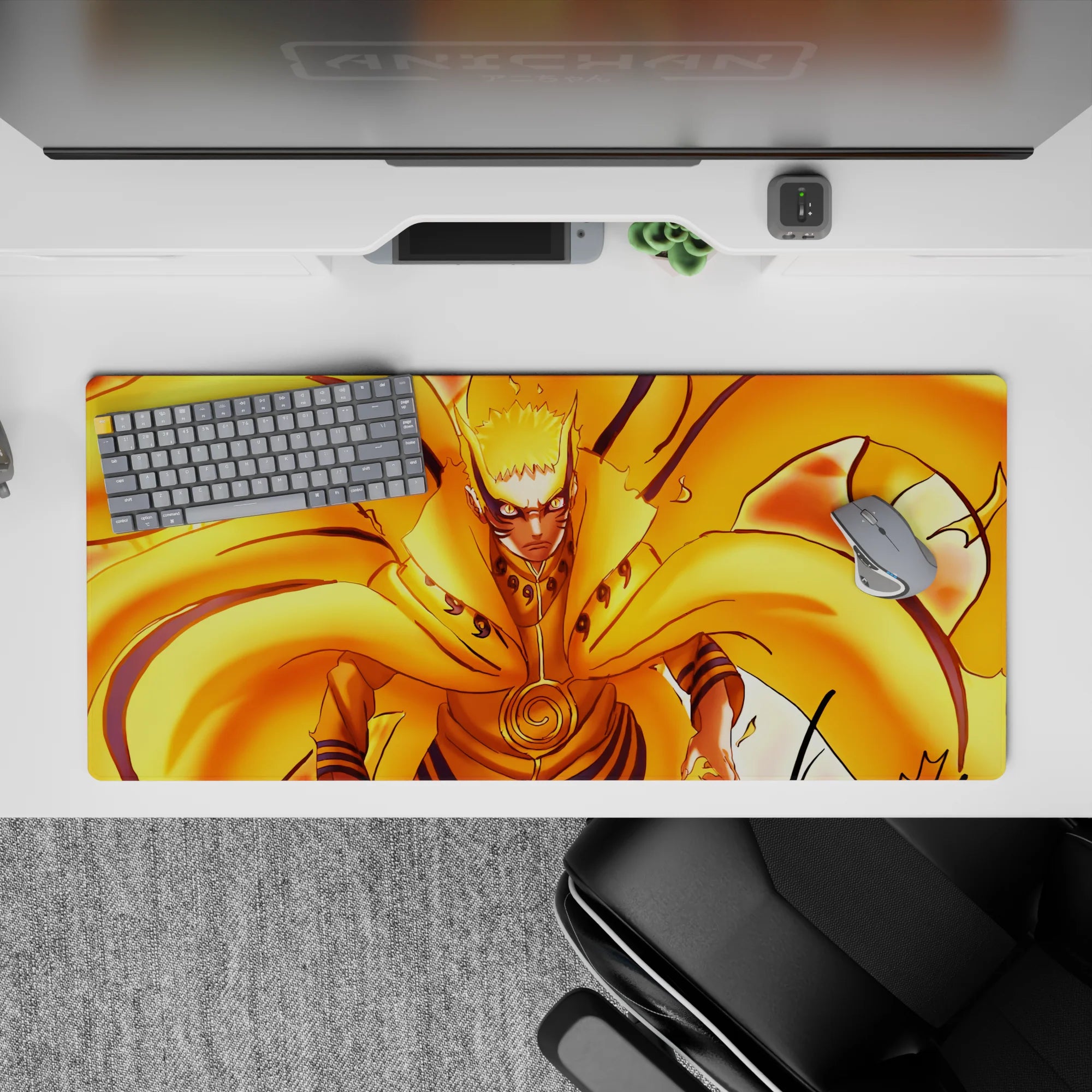 Hot orange and gold chakra flames with bold black line art, cozy high-energy anime desk pad, 36x16 inches.