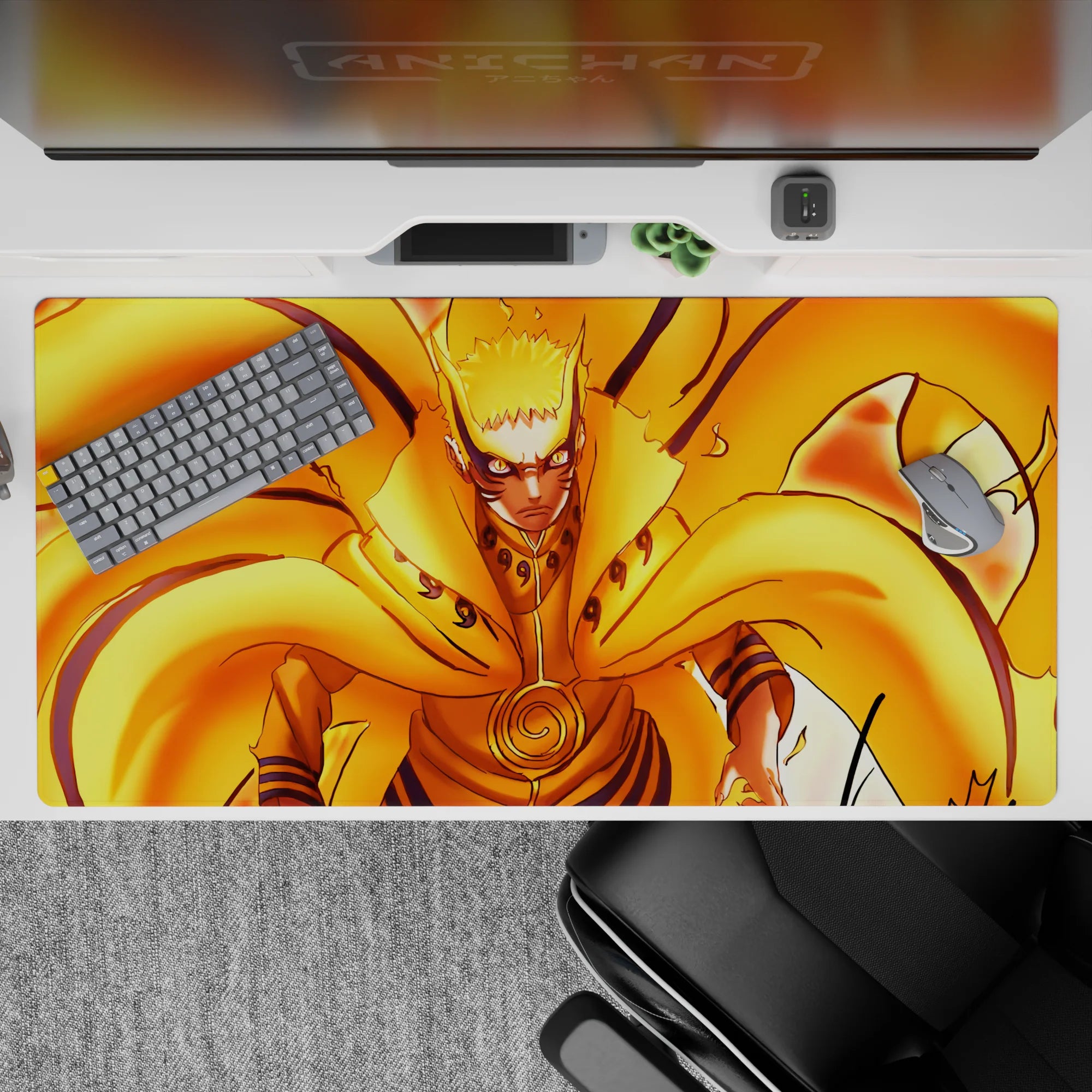 40x20 inches orange and gold fiery Naruto-themed desk pad, fast loud energy with glowing contrast.