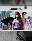 Teal rain haze anime desk pad 40x20 inches with soft silhouettes, umbrellas, and neon time-code glow.