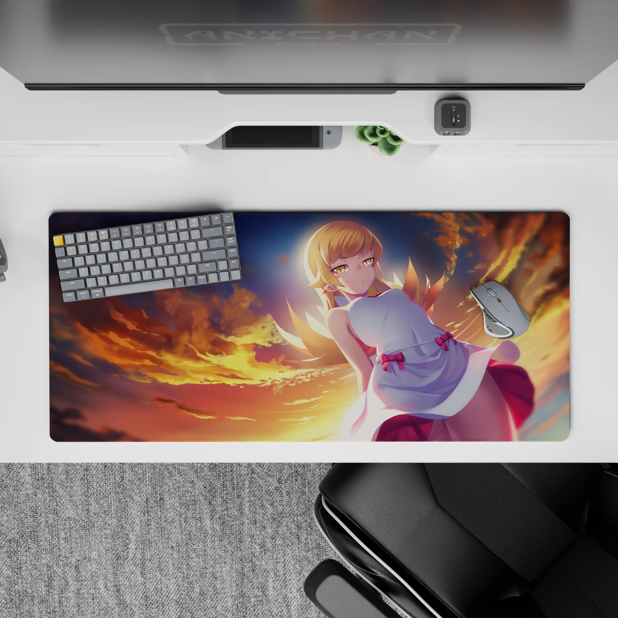 Sunset-themed anime girl desk pad 36x16 inches in warm orange gradients with glowing rim light.