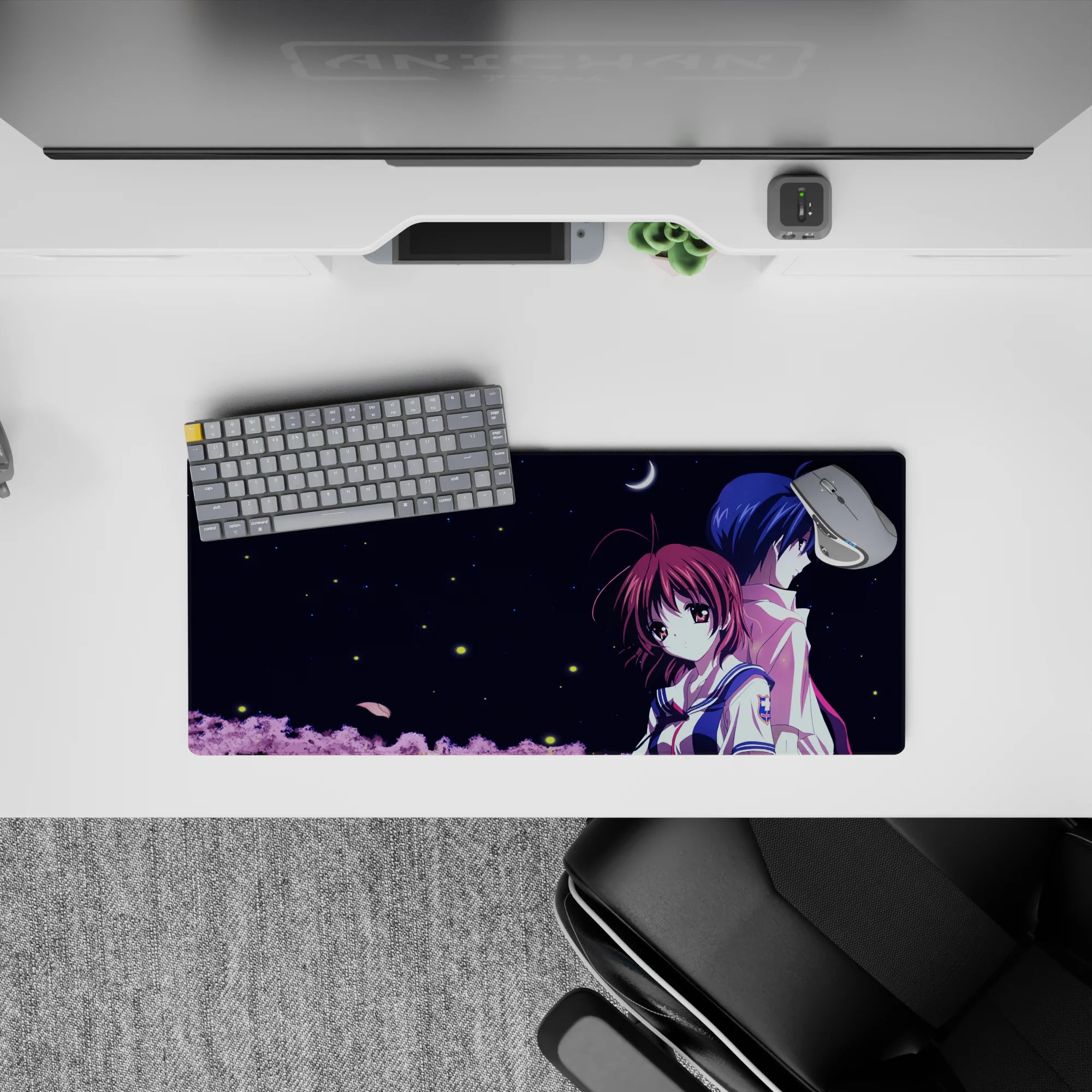 28x12 inches anime mouse pad in midnight navy with crisp white uniform, soft pink treetops, calm vibe.