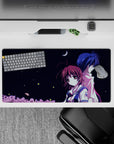 32x16 inches anime mouse pad in midnight navy and white with soft pink treetops, quiet romance vibe.