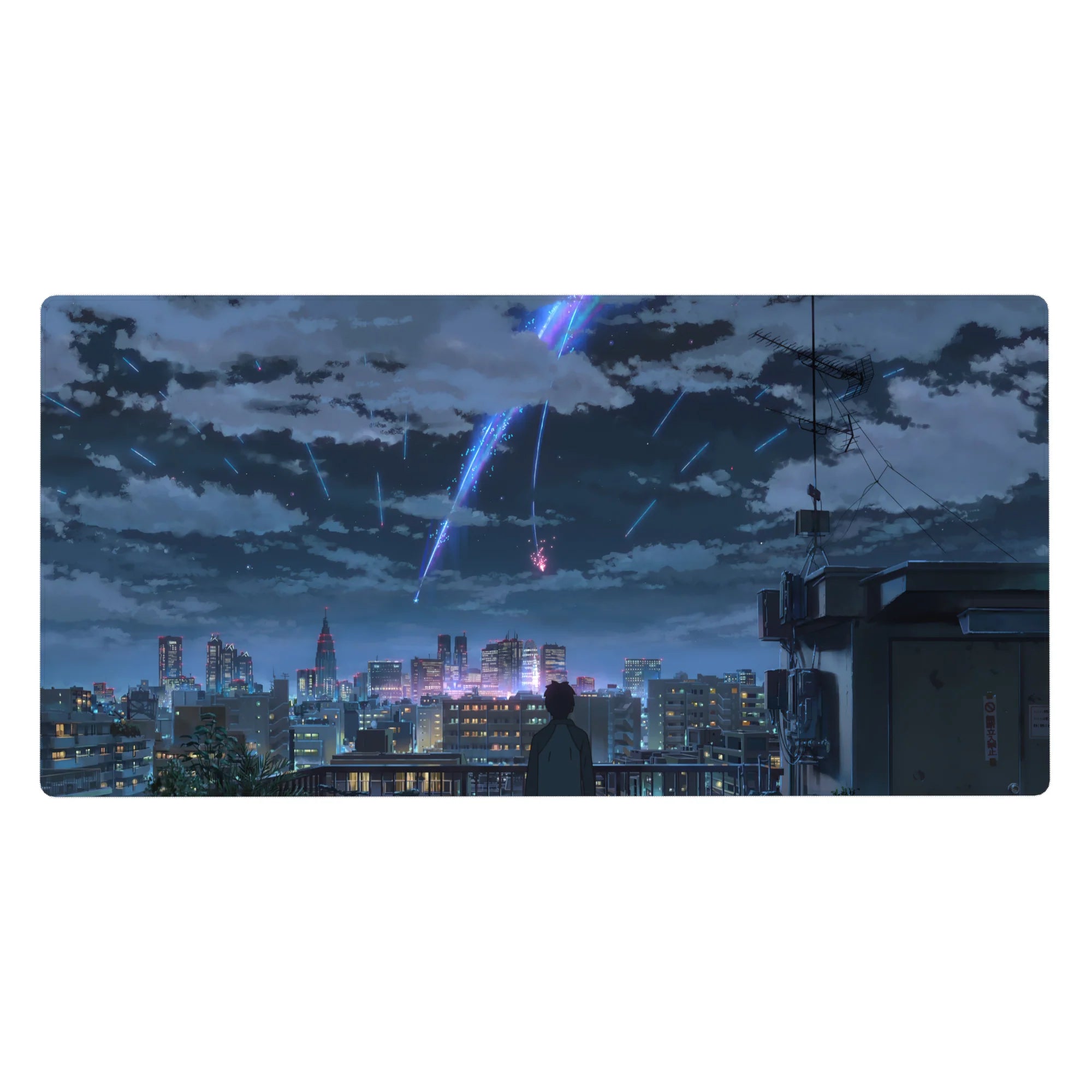 Anime desk pad 40x20 inches with rooftop skyline, glittering city windows, and comet trails in night clouds.