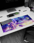 36x16 inches anime desk pad showing silver-haired hero and purple-haired mage with floating orb above her hand.