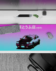 Neon purple-to-cyan dusk vibe anime desk pad 36x16 inches with glitch edges and pop-up glow.