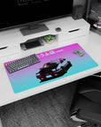 32x16 inches anime mouse pad featuring a front-facing Trueno AE86 under neon dusk, low stance and headlights.