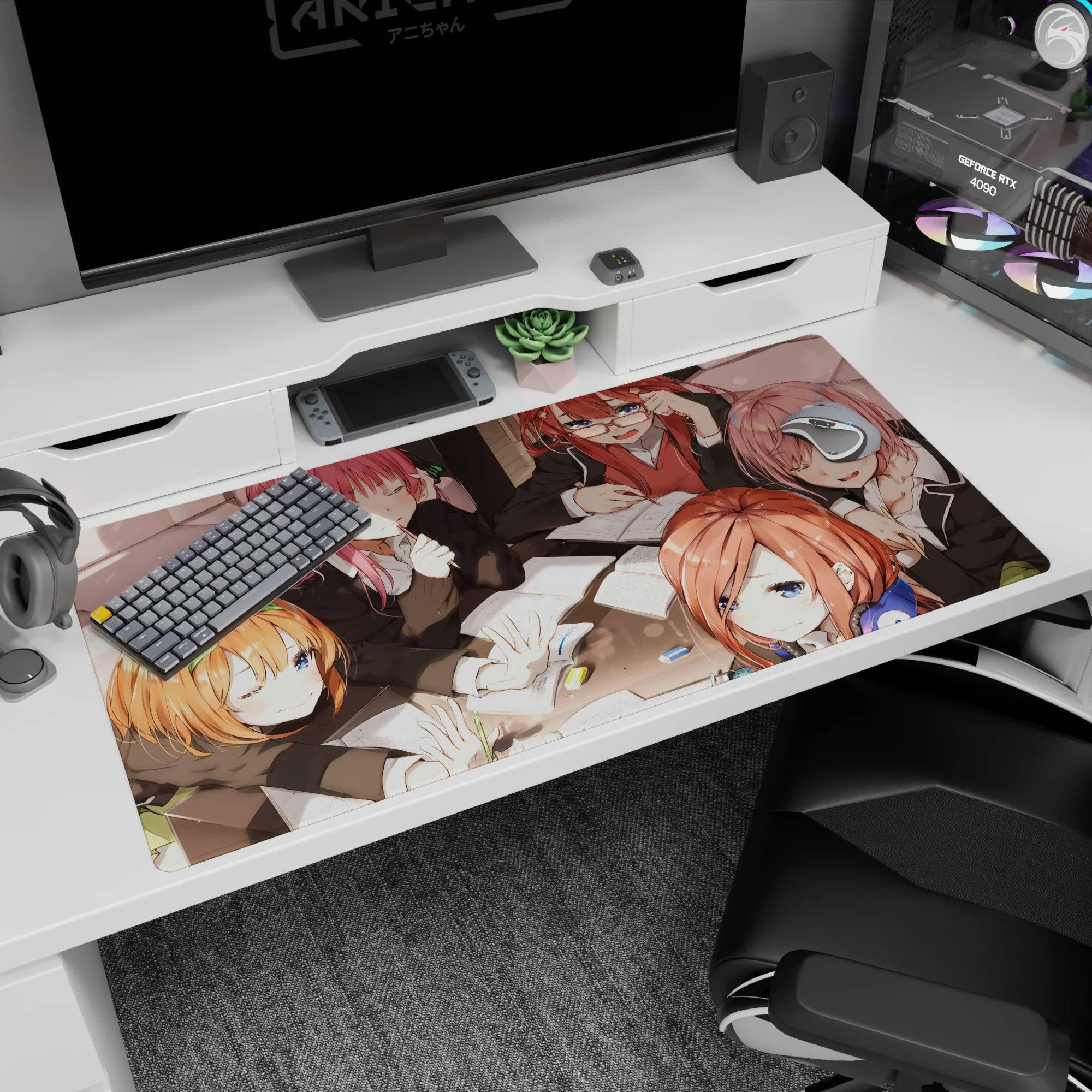 40x20 inches anime girl desk pad scene: winking girl shushes, glasses girl complains, green bow troublemaker.