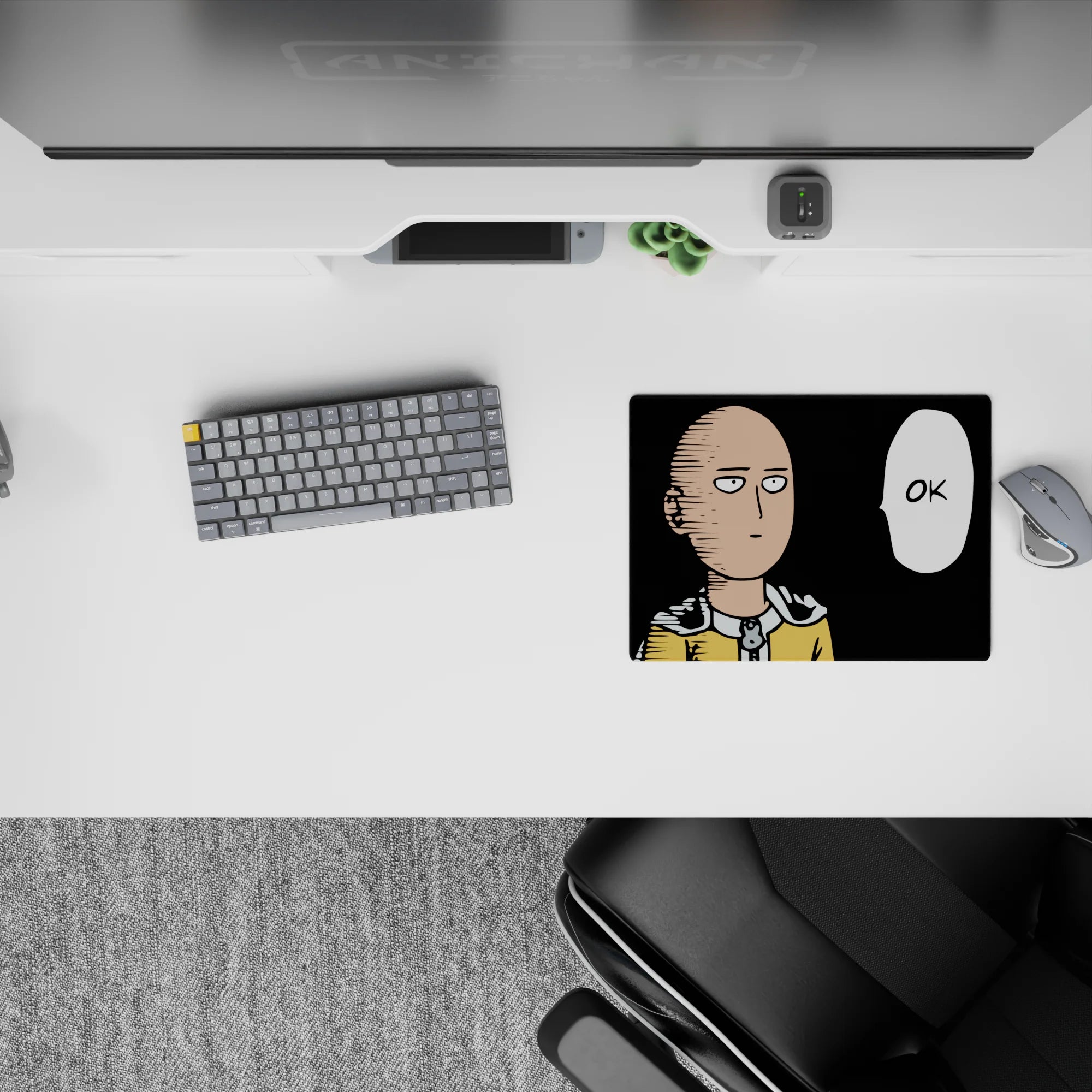 Minimal black-and-yellow anime mouse pad 14x10 inches, clean lines and deadpan OK bubble, calm vibe.