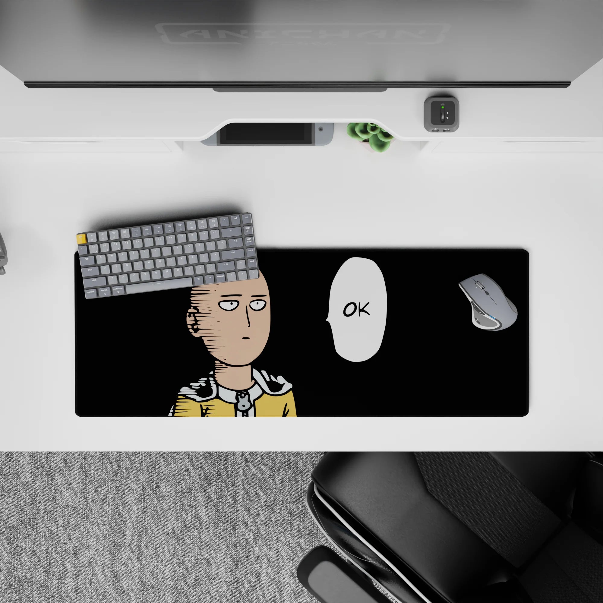 32x12 inches anime mouse pad with bold black backdrop, bright yellow suit, and calm deadpan humor vibe.