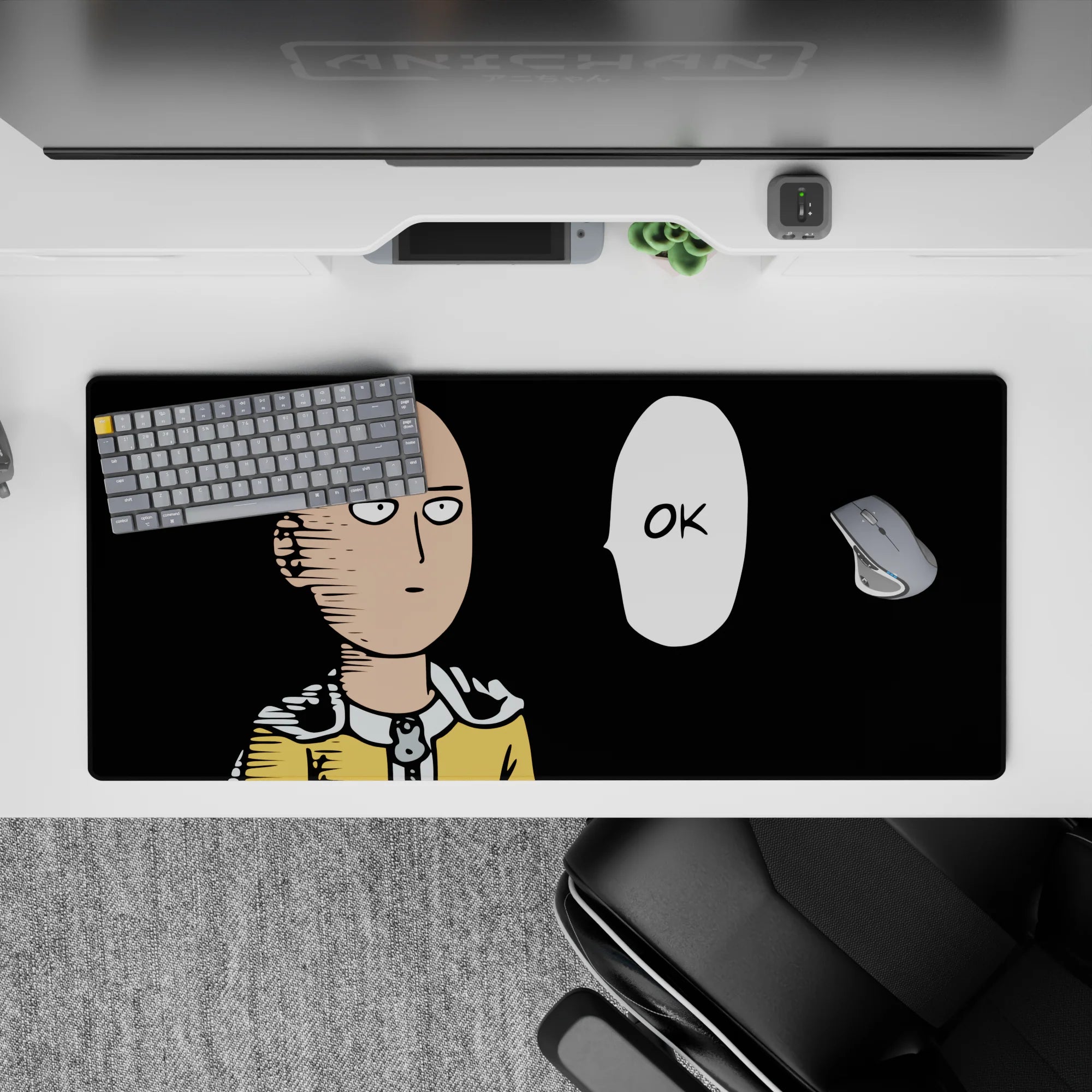 36x16 inches desk pad in bold black and yellow, clean lines and deadpan OK bubble, calm funny vibe.