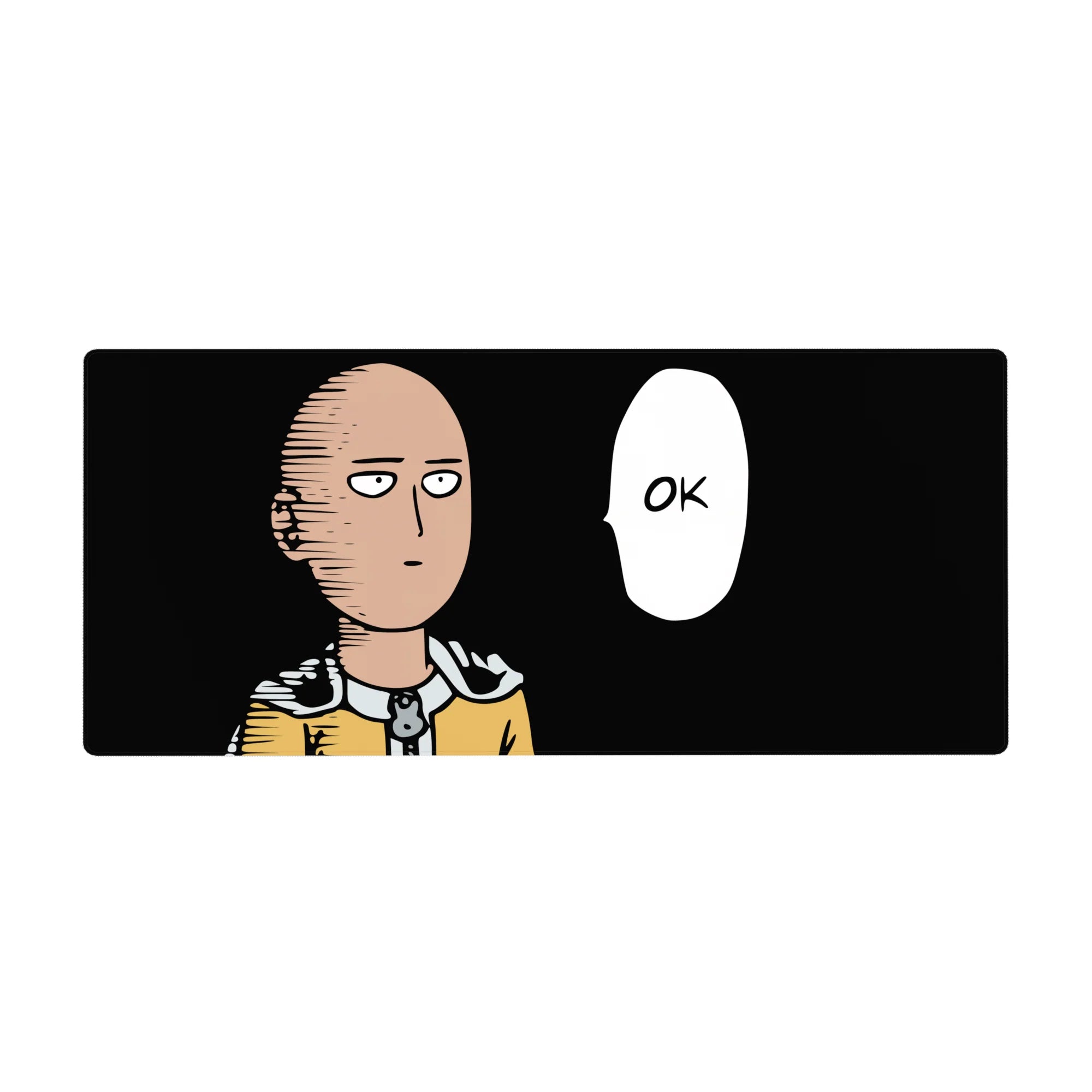 36x16 inches anime desk pad with Saitama on black background, yellow suit, cape clasp, OK speech bubble.