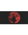 Anime desk pad 36x16 inches with crimson moon, starry sky, and silhouetted sword warrior, cinematic art.