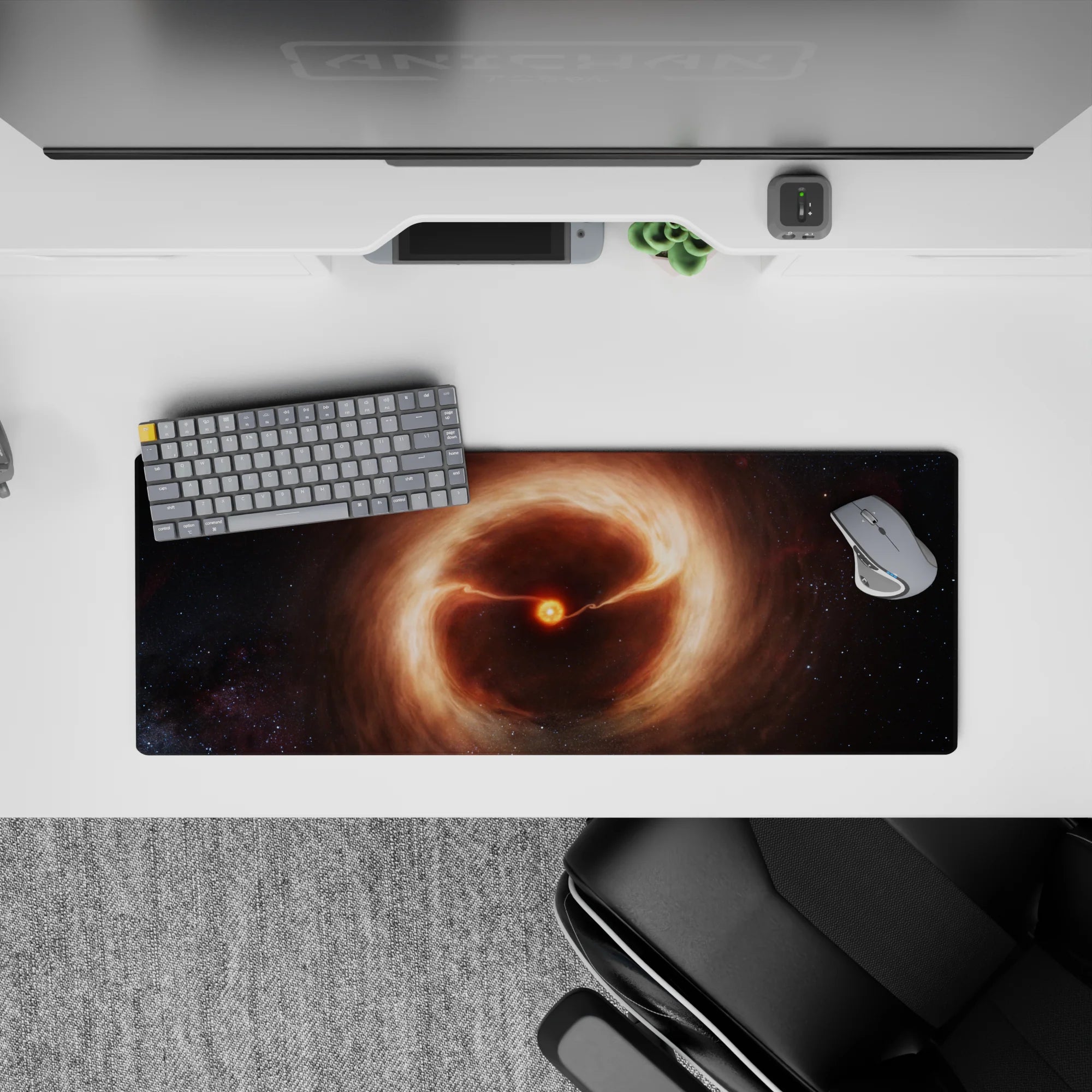 Sleepy cosmic mouse pad 32x12 inches in warm orange glow, soft browns, and shadowy blacks.