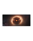 Galaxy swirl desk mouse pad 28x12 inches with smoky amber clouds on a deep inky space background.