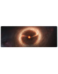 Galaxy swirl desk mouse pad 32x12 inches with smoky amber clouds on deep inky space background.