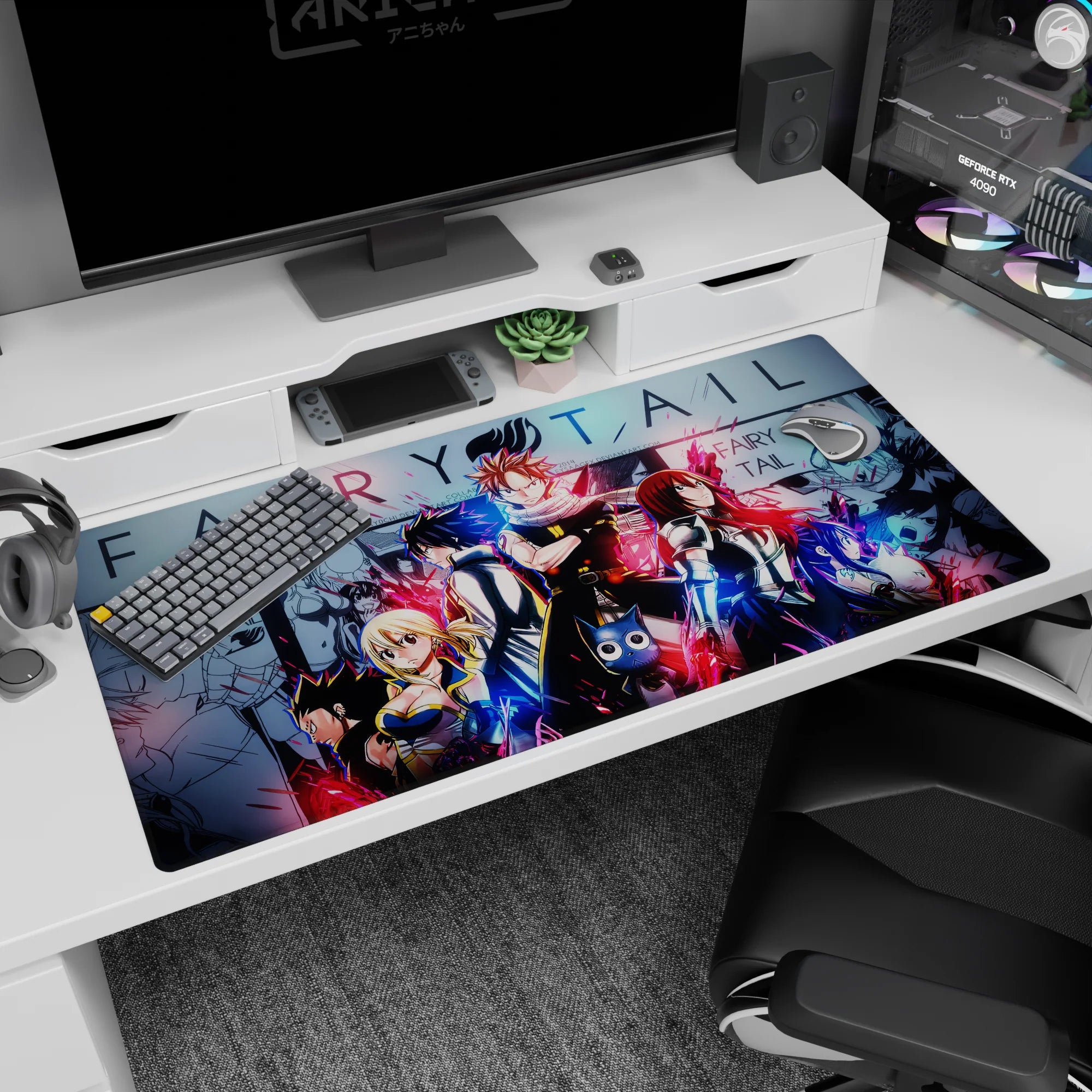 Natsu in his scarf front and center on a Fairy Tail anime desk pad 40x20 inches, with Lucy and Gray.