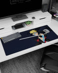 36x16 inches Boruto Uzumaki desk pad, blade raised, karma patterns glowing down his arm on dark background.