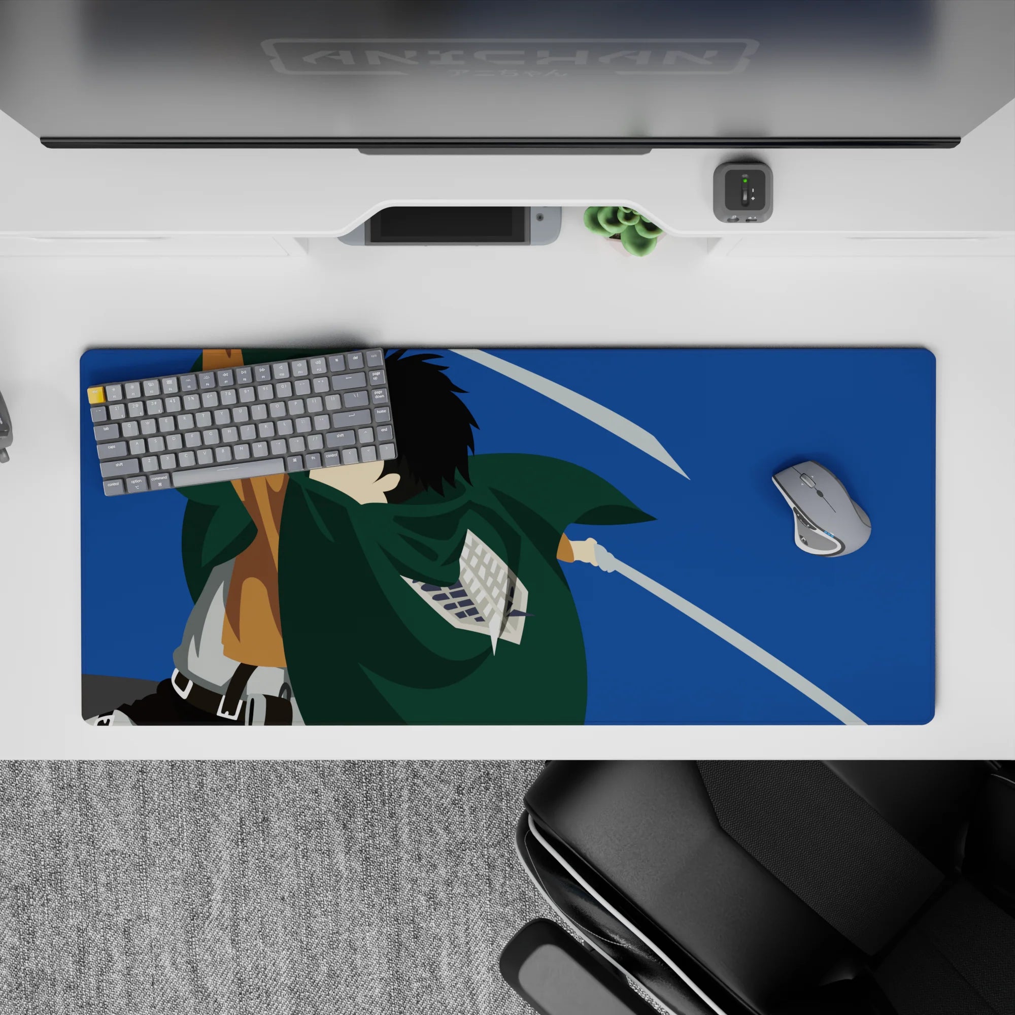 Attack on Titan desk pad 36x16 inches, featuring a Scout Regiment soldier in action with drawn blades against a blue sky.