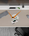 Calming warm beige anime desk pad with bright orange V-fins, white armor, teal accents, 40x20 inches.