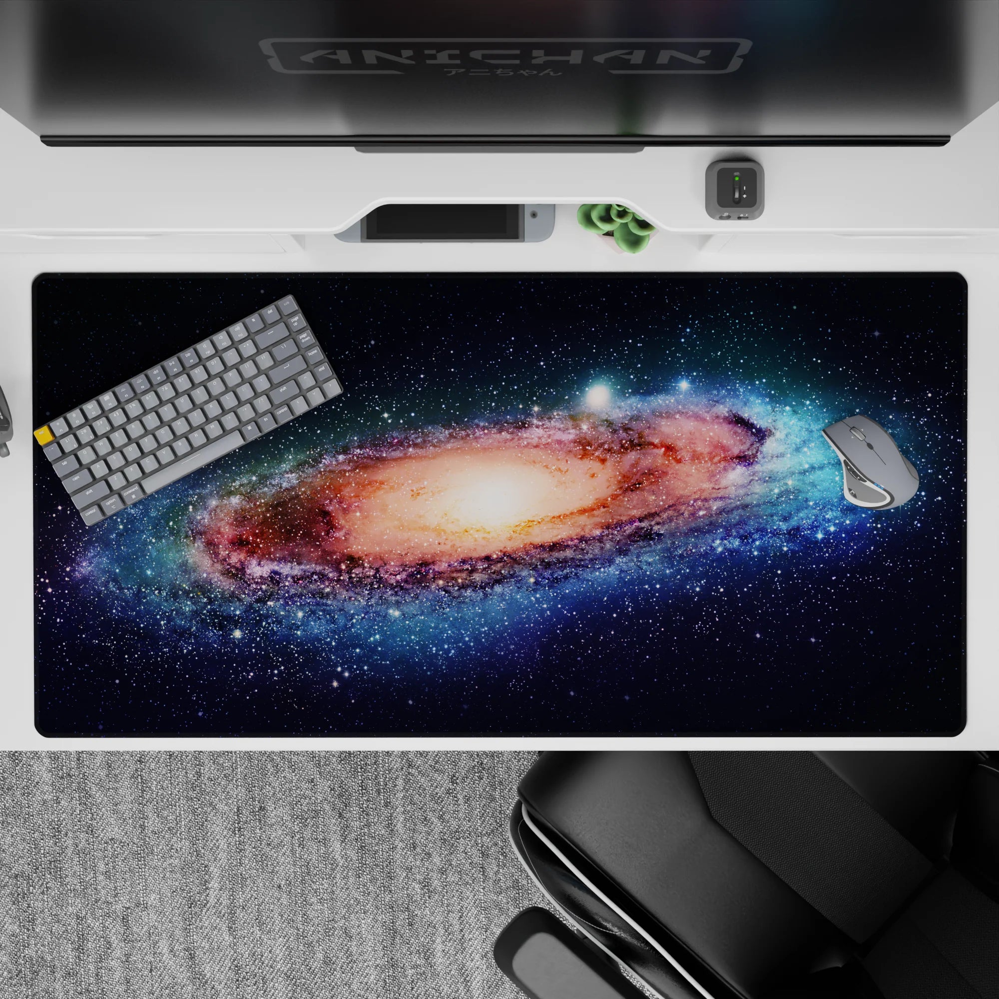 Midnight navy to icy blue with warm peach core desk pad, dreamy cosmic mood, 40x20 inches.