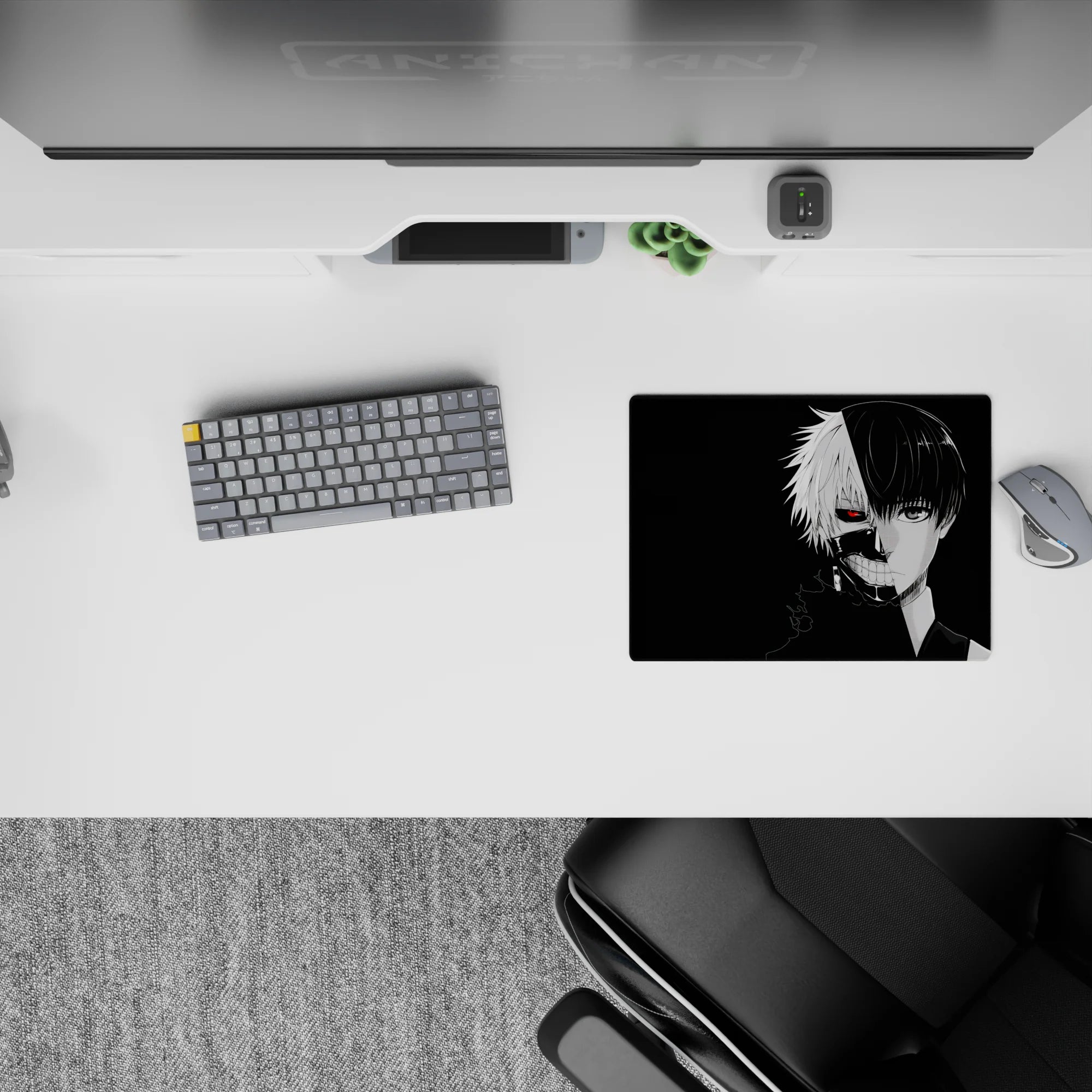 Kaneki&#39;s split face from Tokyo Ghoul mouse pad, 14x10 inches, features his red eye and mask on a striking black background.