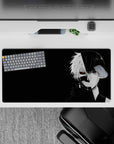 Kaneki split-face Tokyo Ghoul anime mouse pad, 32x16 inches, featuring a dramatic black background and vivid red eye.