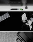 Kaneki split face Tokyo Ghoul mouse pad, 40x20 inches, monochrome design with red eye, black background.
