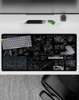 32x16 inches anime mouse pad in deep black with fine white linework and cold neon blue schematic panels.