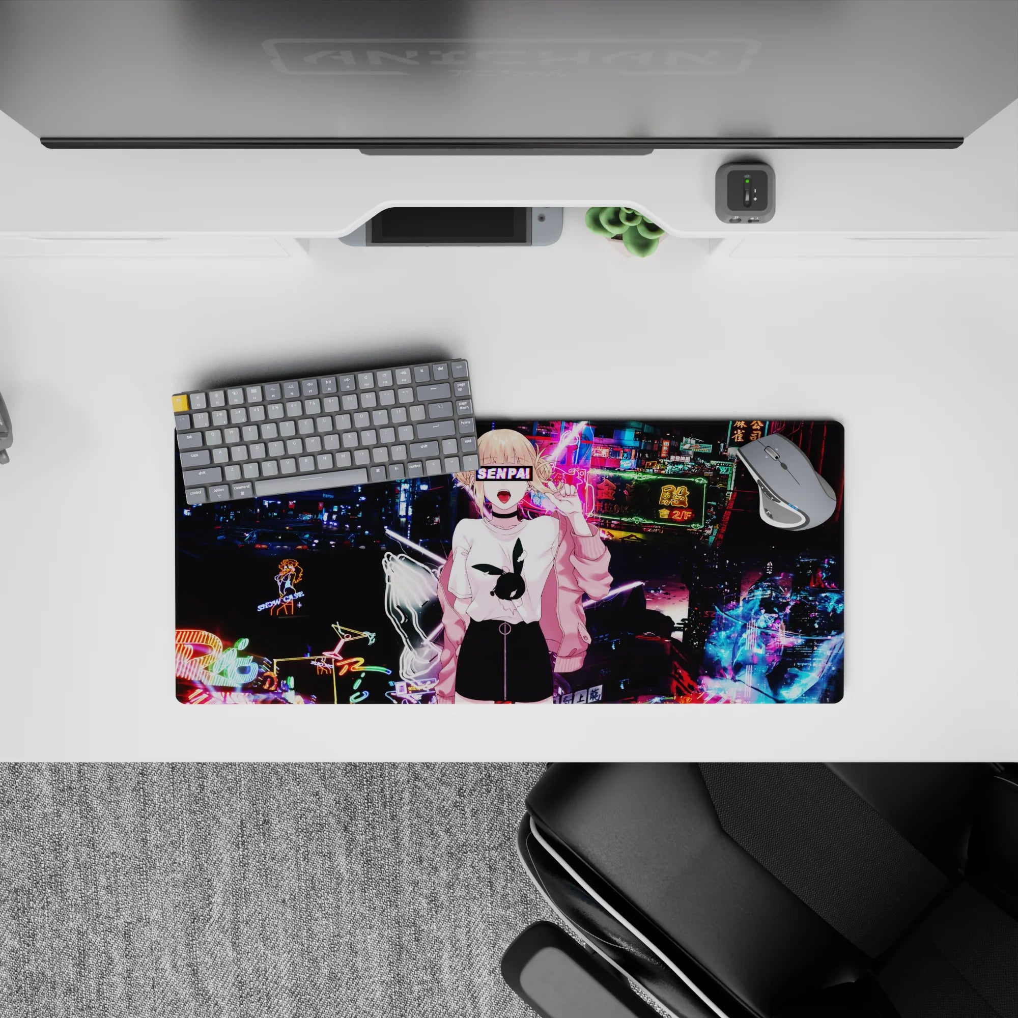 Cyberpunk anime mouse pad 28x12 inches in electric blues and magenta, glitchy night arcade vibes.