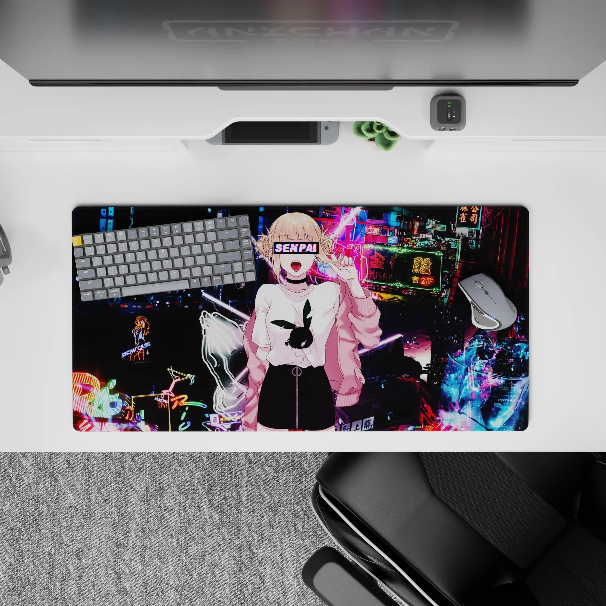 Anime girl mouse pad 32x16 inches in electric blue and magenta neon, glitchy arcade-night vibe.