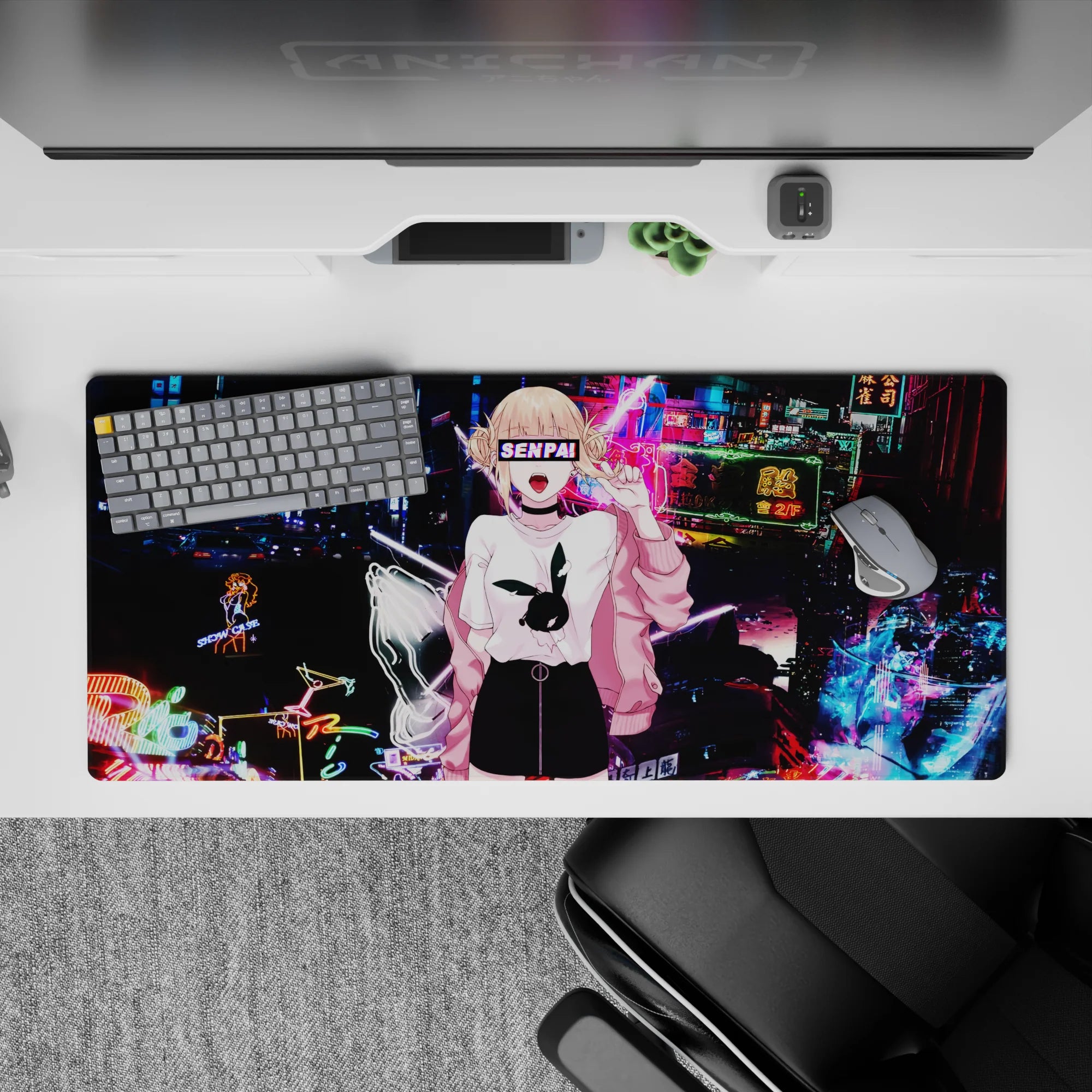 Cyberpunk anime desk pad 36x16 inches in electric blues and magenta, glitchy trails, bubblegum vibe.