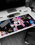 40x20 inches anime desk pad featuring blonde twin-bun girl in pink jacket, bunny logo tee, neon signs.