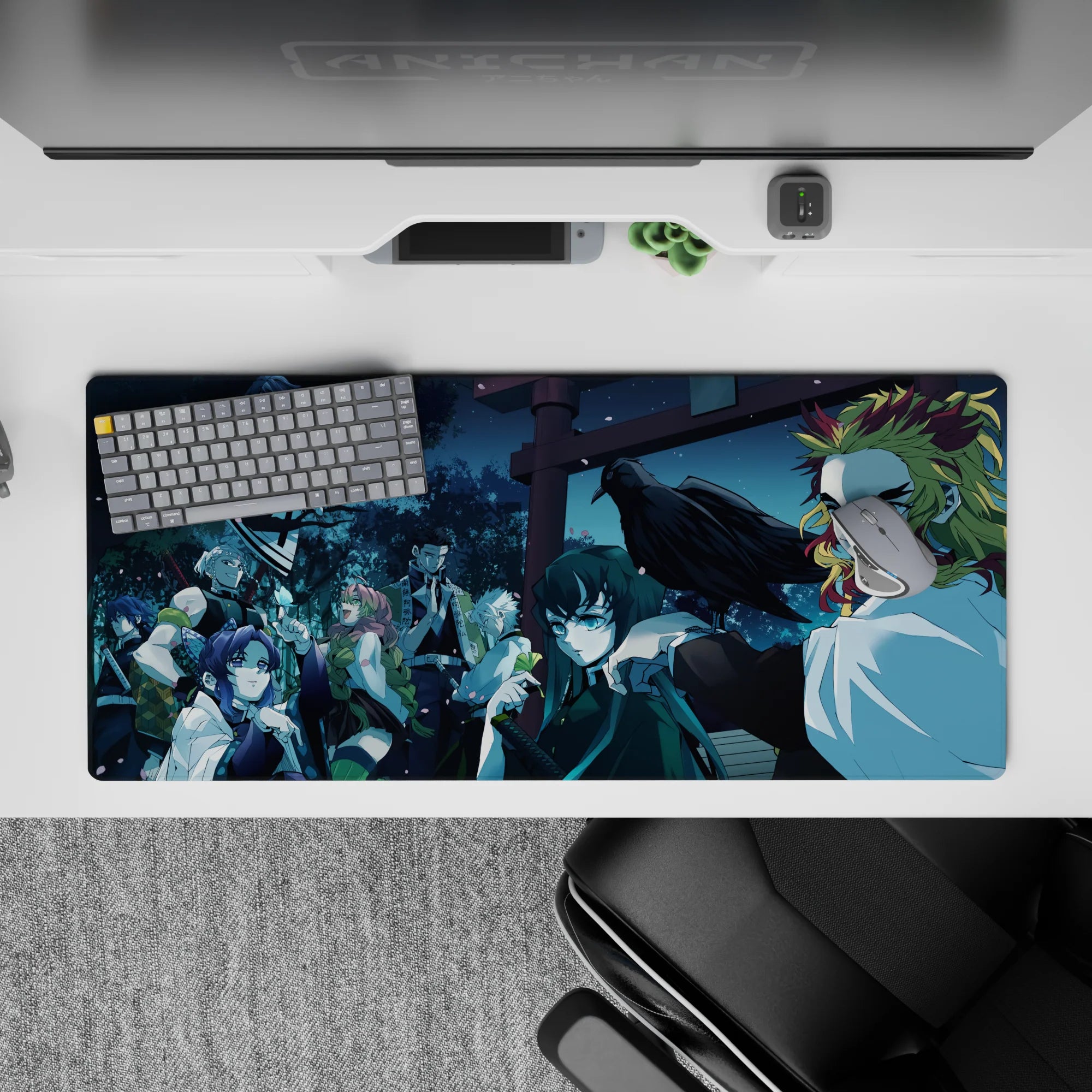 Anime desk pad 36x16 inches featuring Hashira under moonlit canopy; includes Rengoku, Shinobu, cherry blossoms.