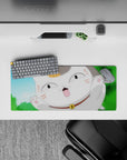 28x12 inches anime mouse pad in blue sky and green blur, white-and-orange cat with blush, cheerful vibe.